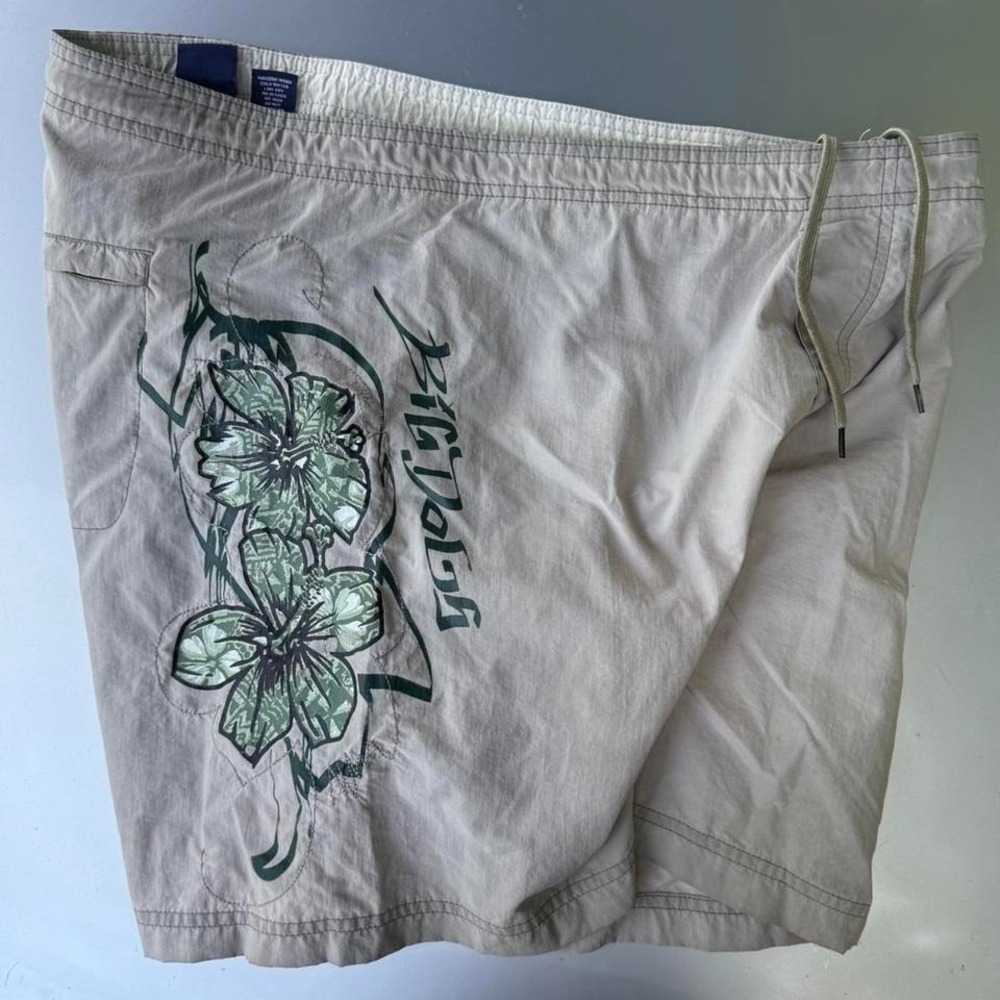 Big Dogs Surfwear beige shorts with green hibiscus design